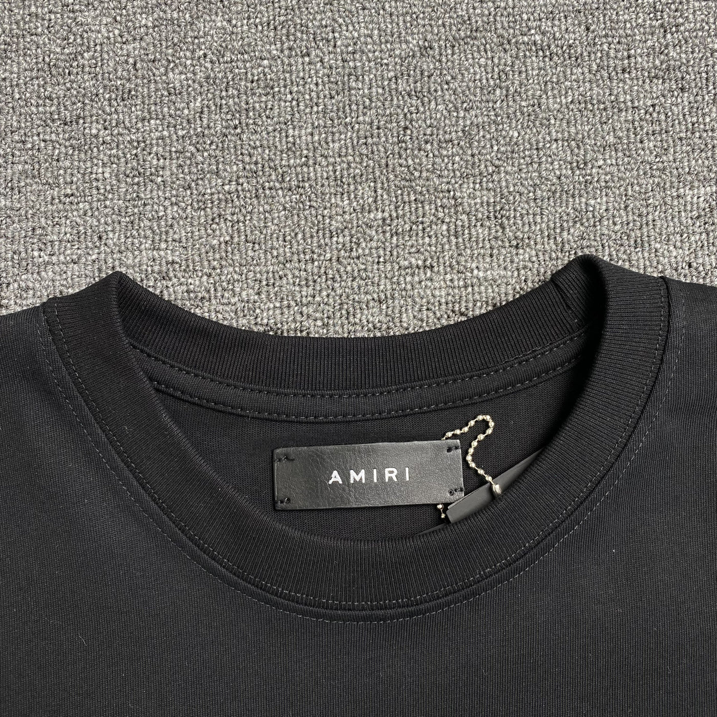 Amiri Tee