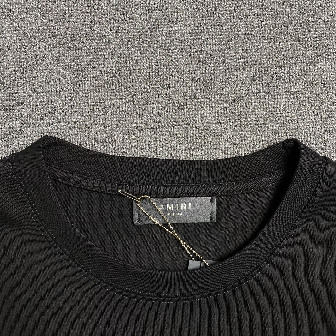 Amiri Tee