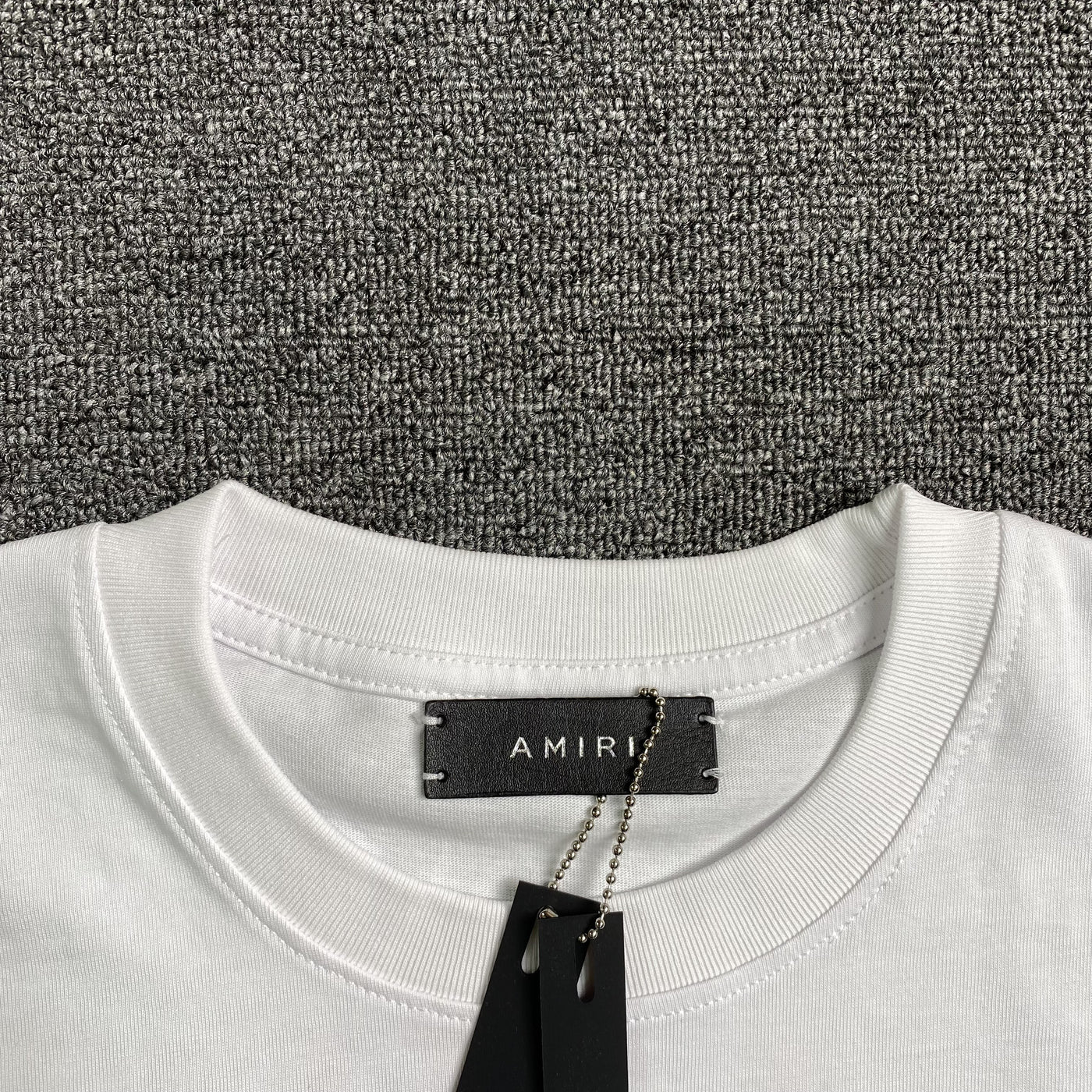 Amiri Tee