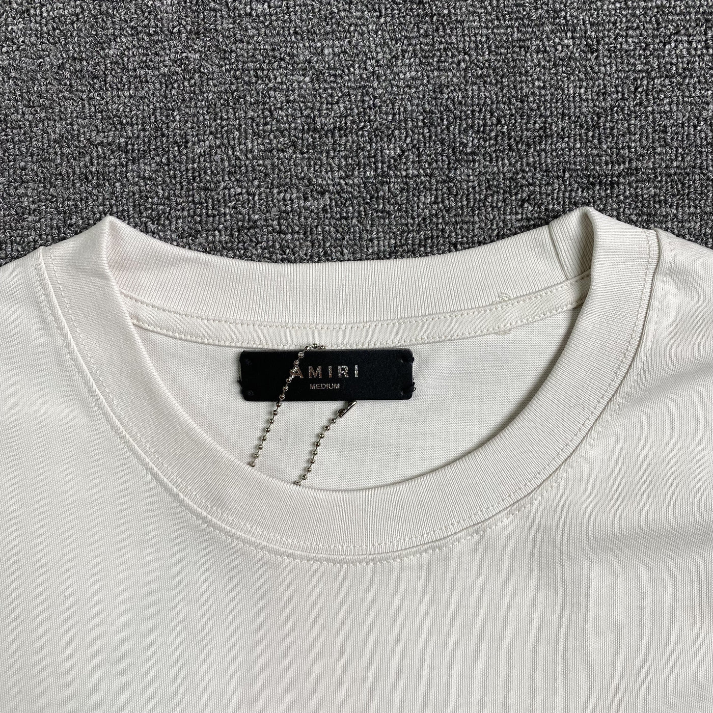 Amiri Tee