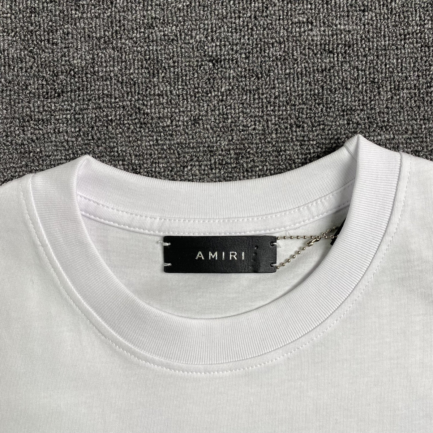 Amiri Tee