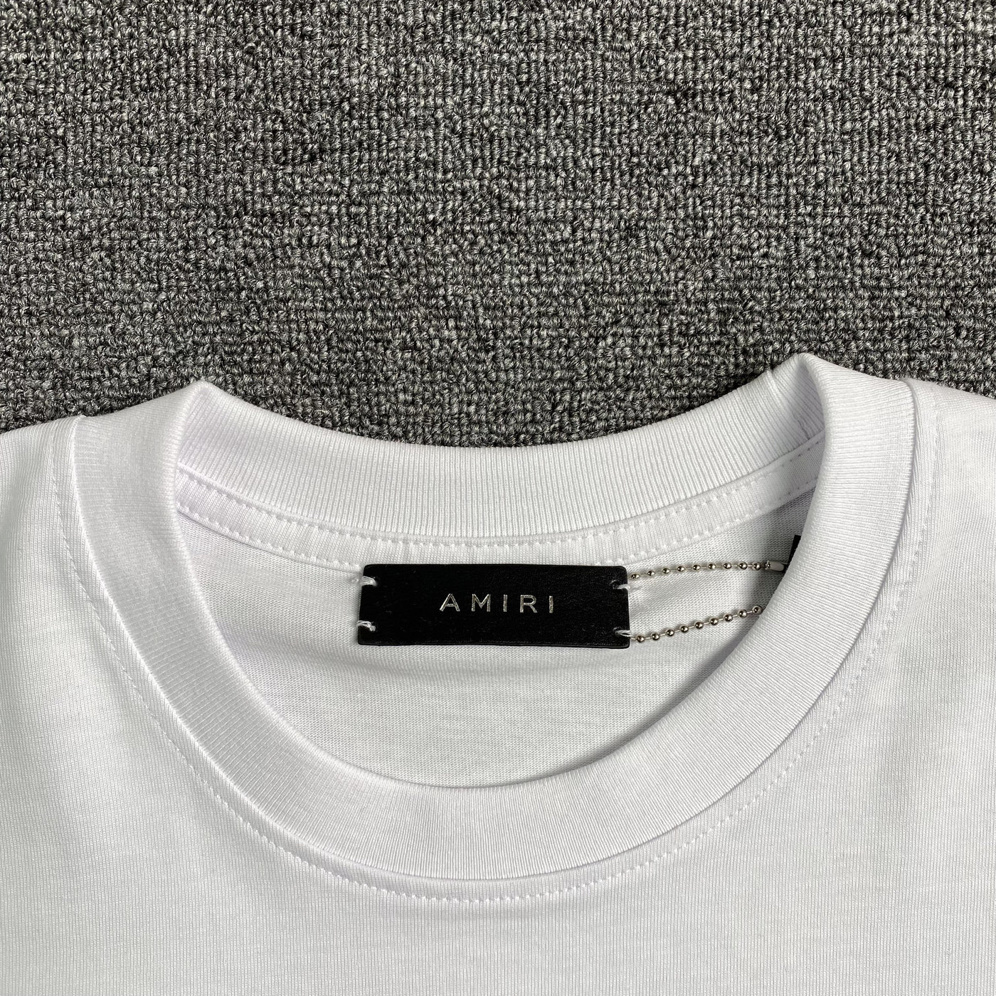 Amiri Tee