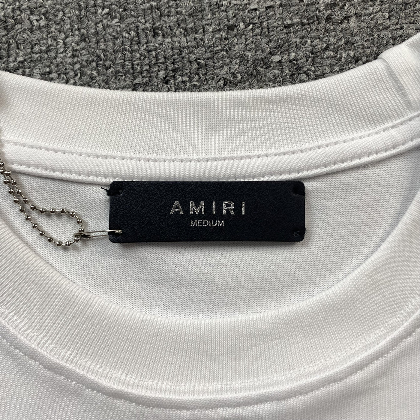 Amiri Tee