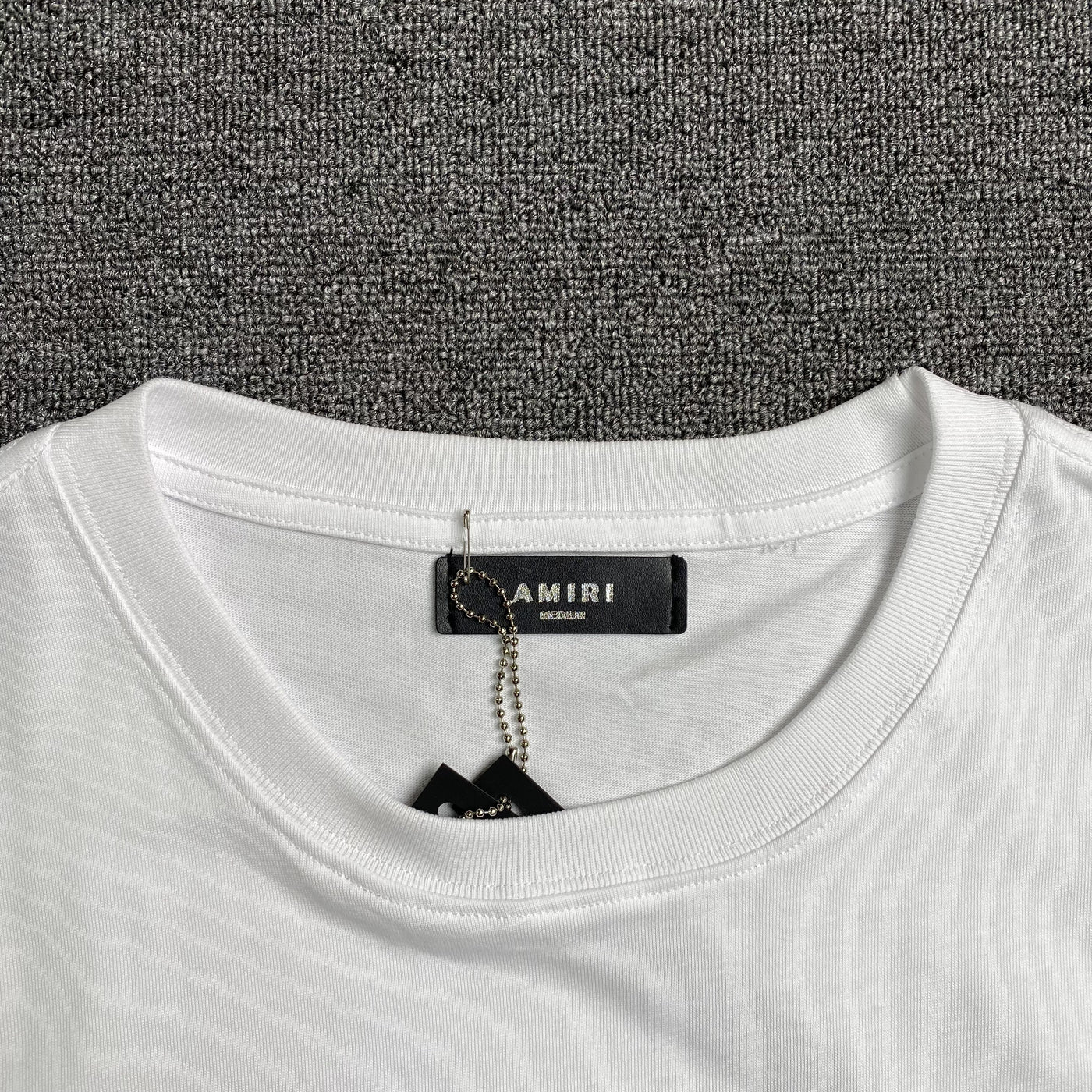 Amiri Tee