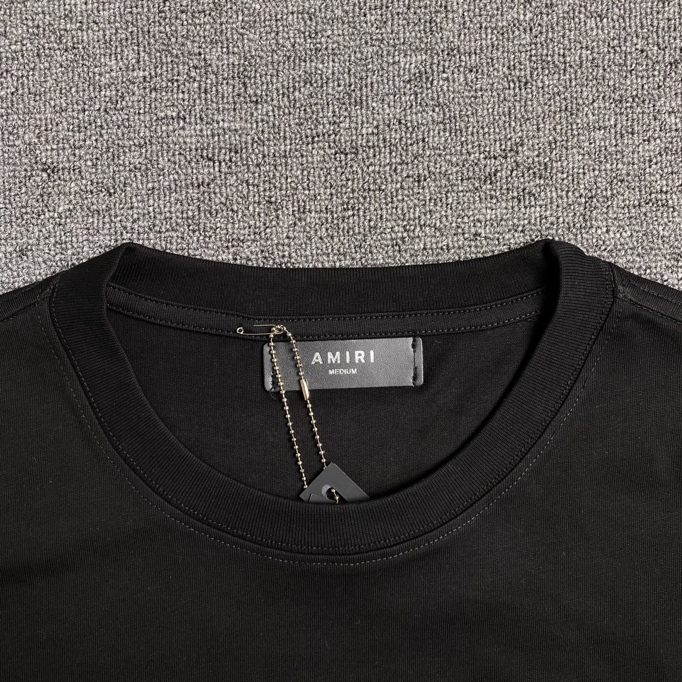 Amiri Tee