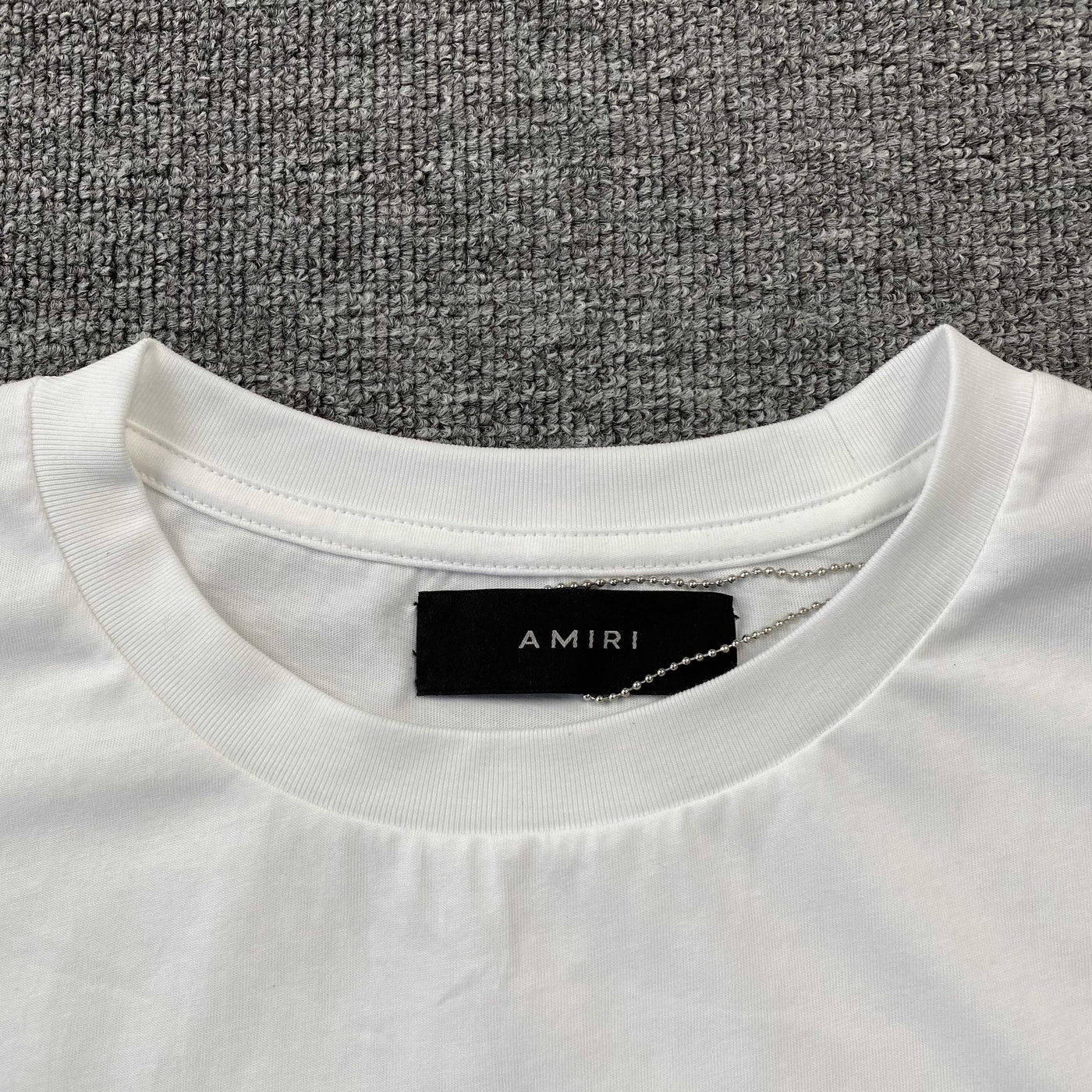 Amiri Tee