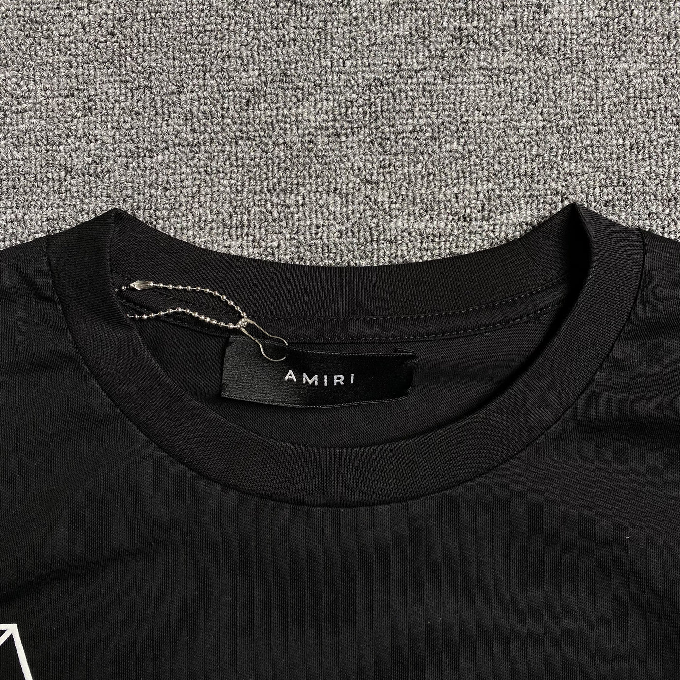 Amiri Tee