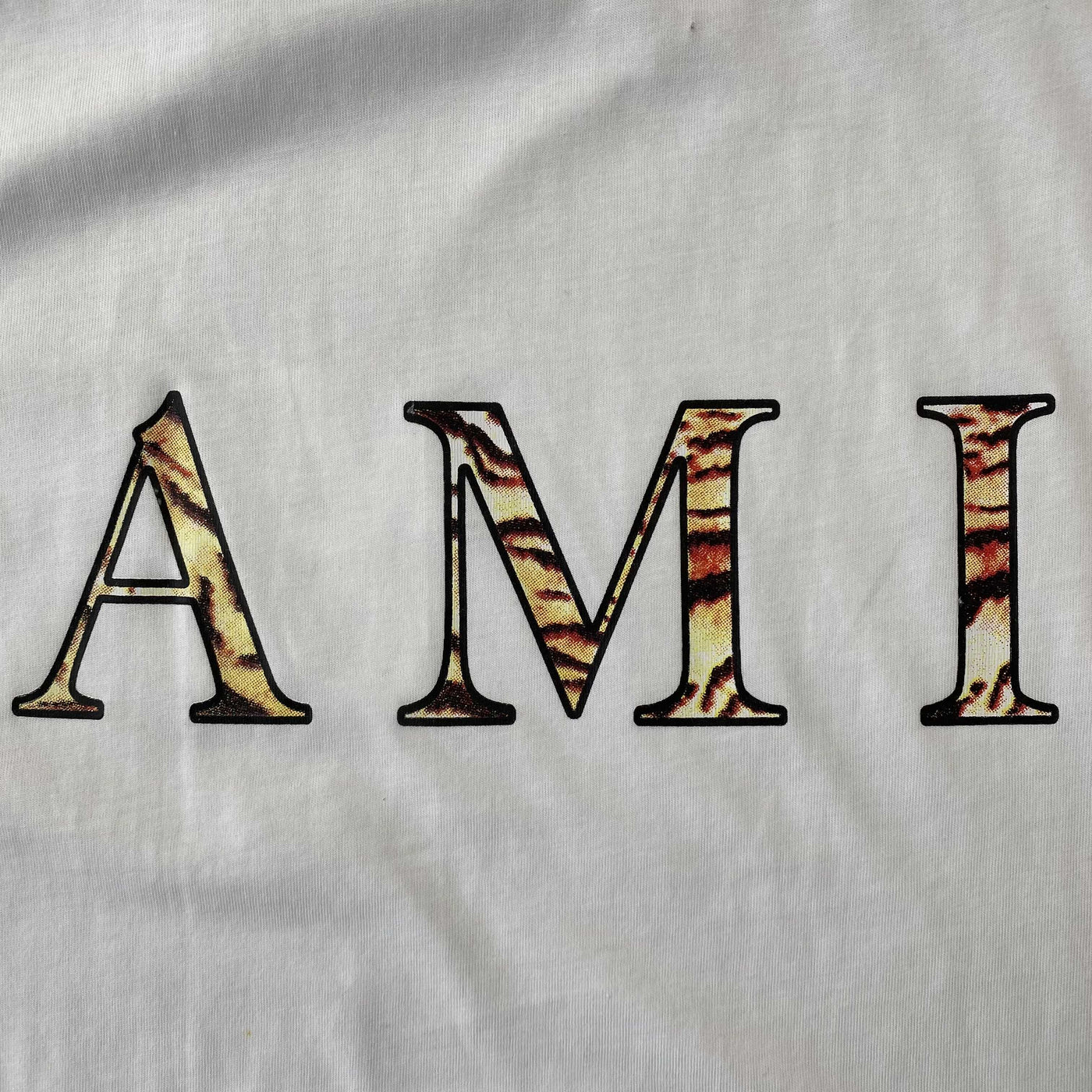 Amiri Tee