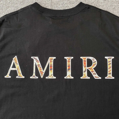 Amiri Tee