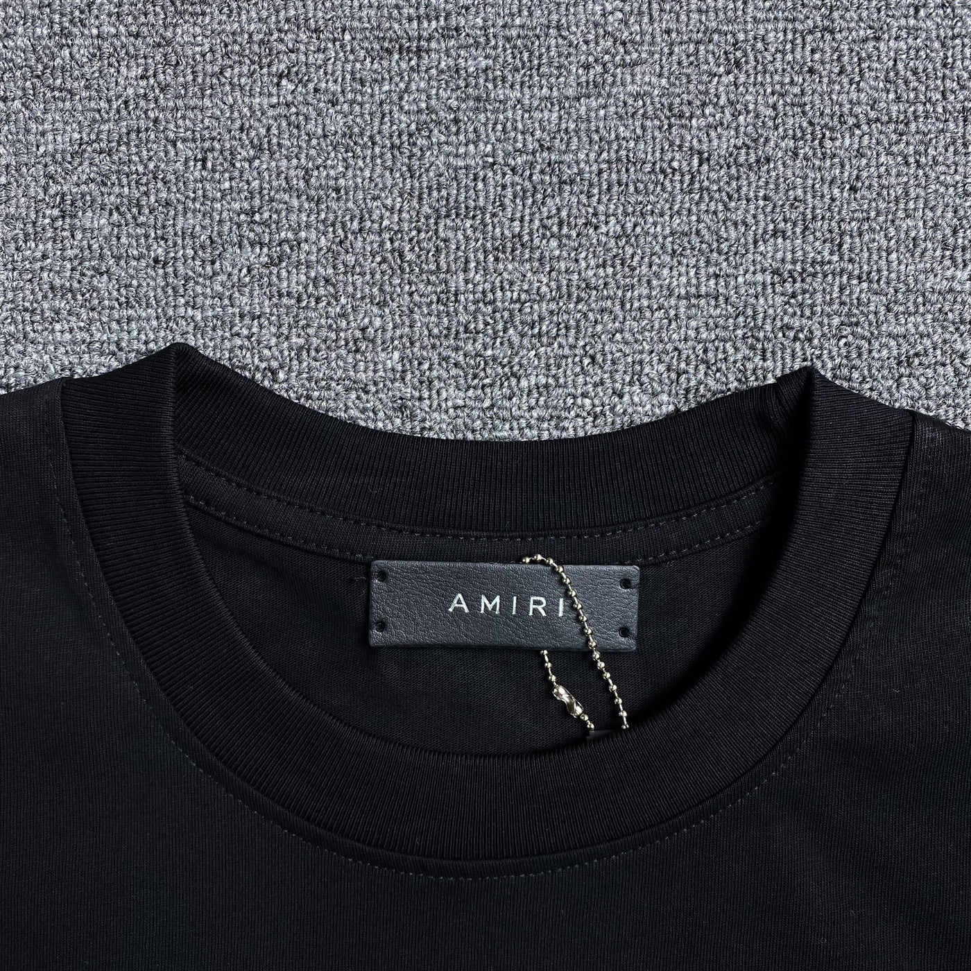 Amiri Tee