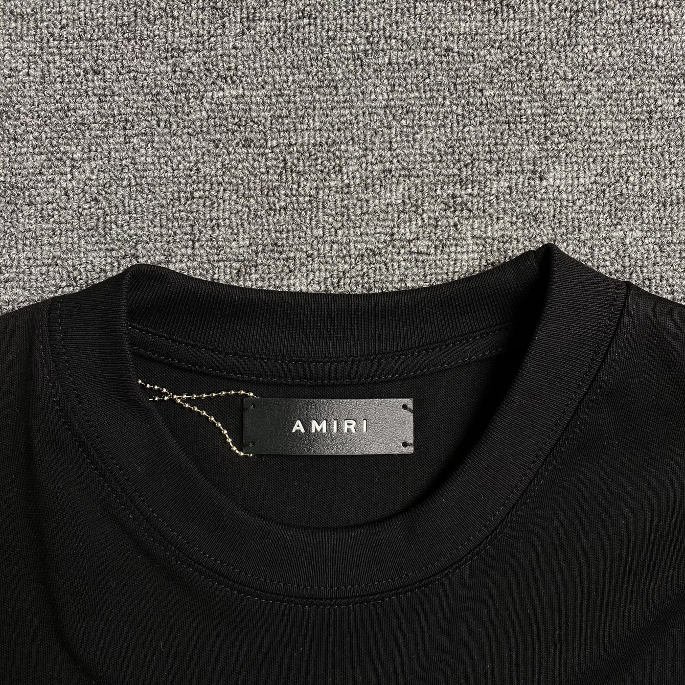 Amiri Tee