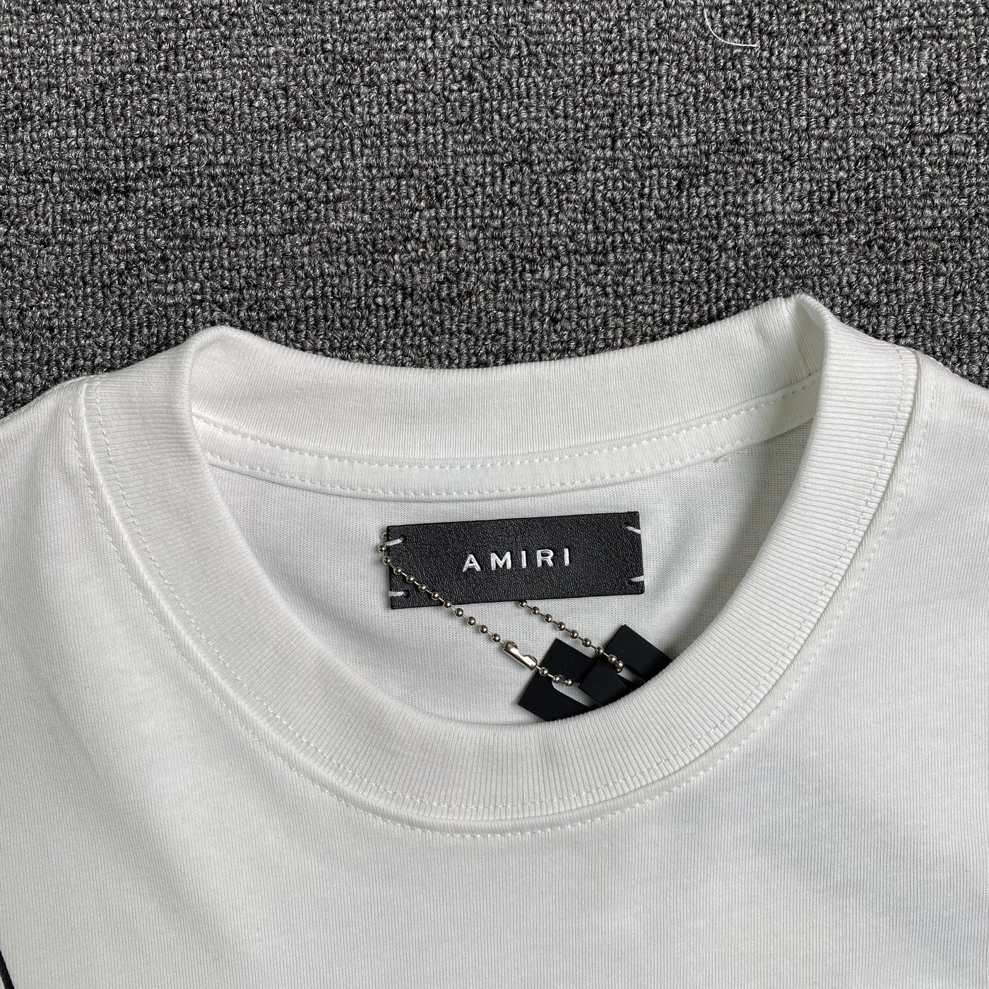 Amiri Tee