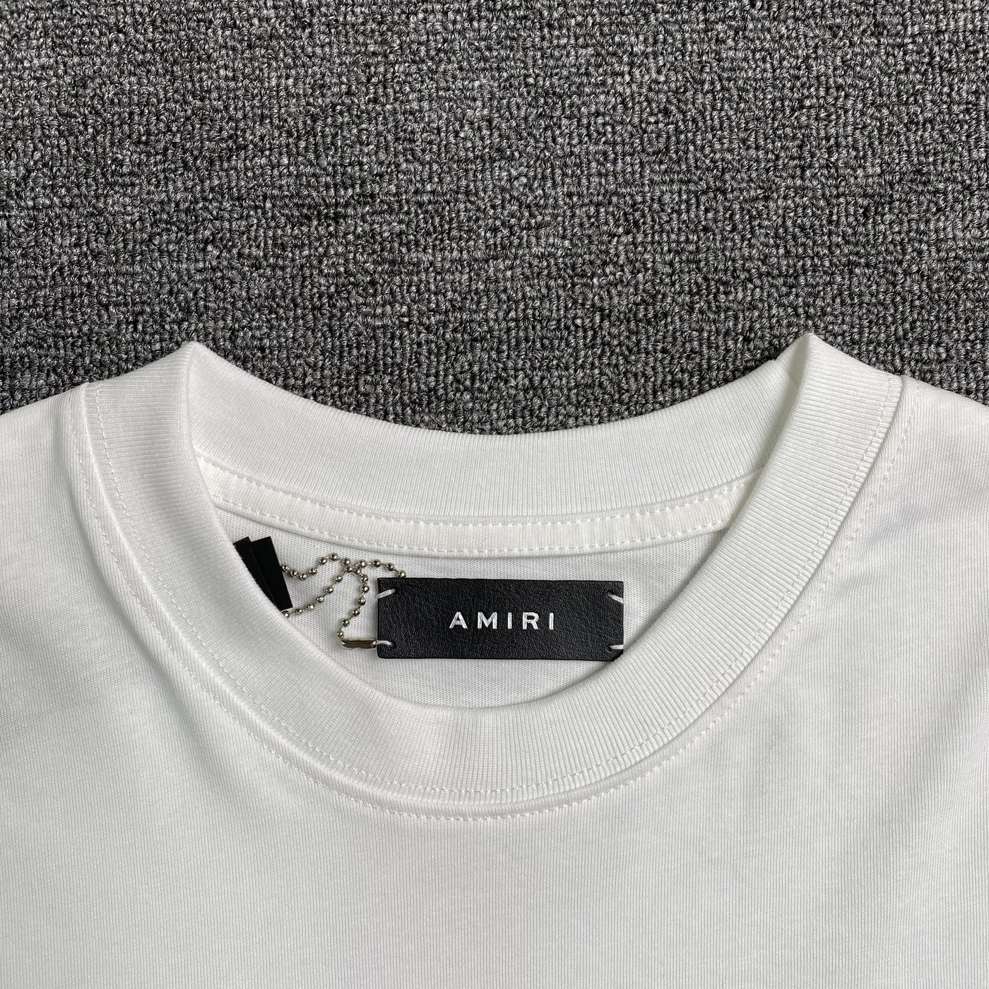 Amiri Tee