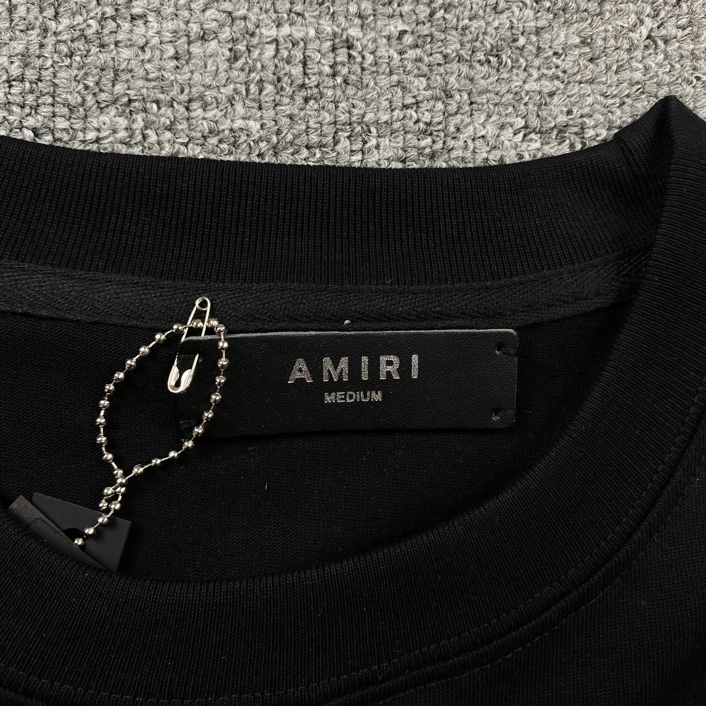 Amiri Tee