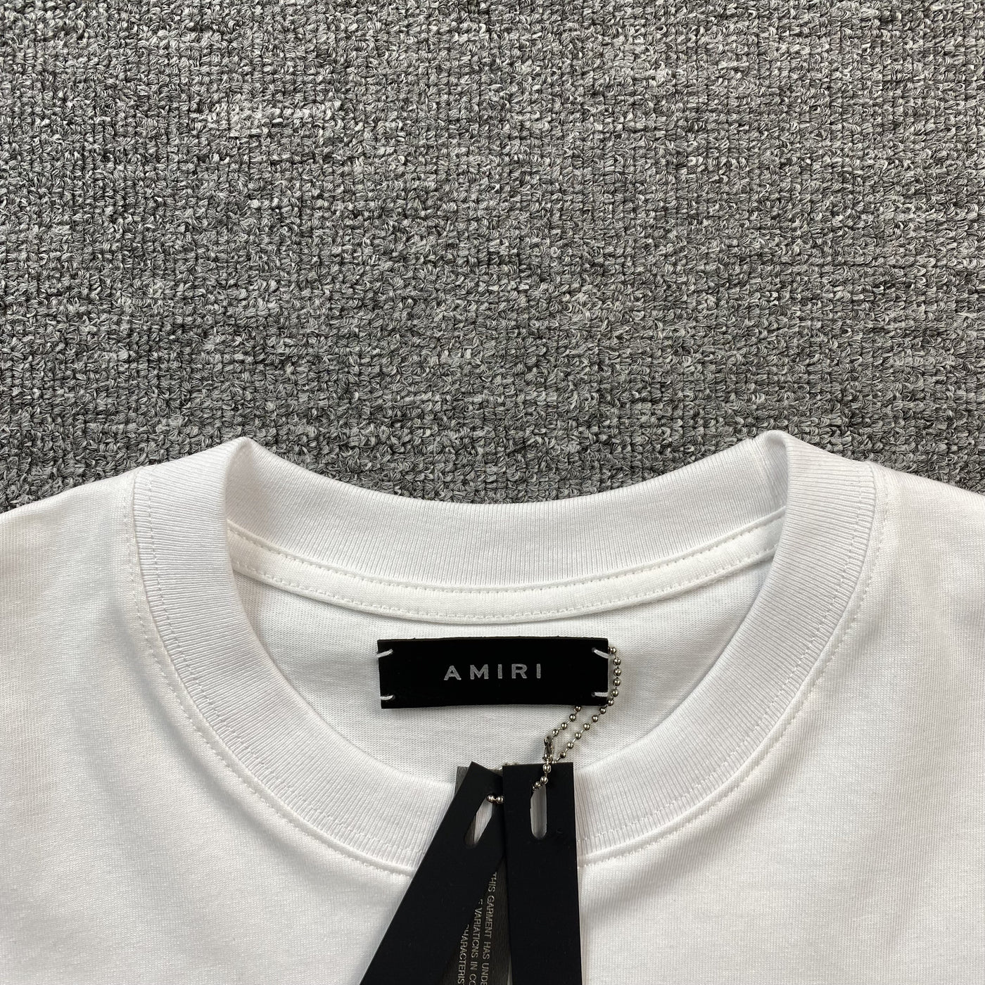 Amiri Tee