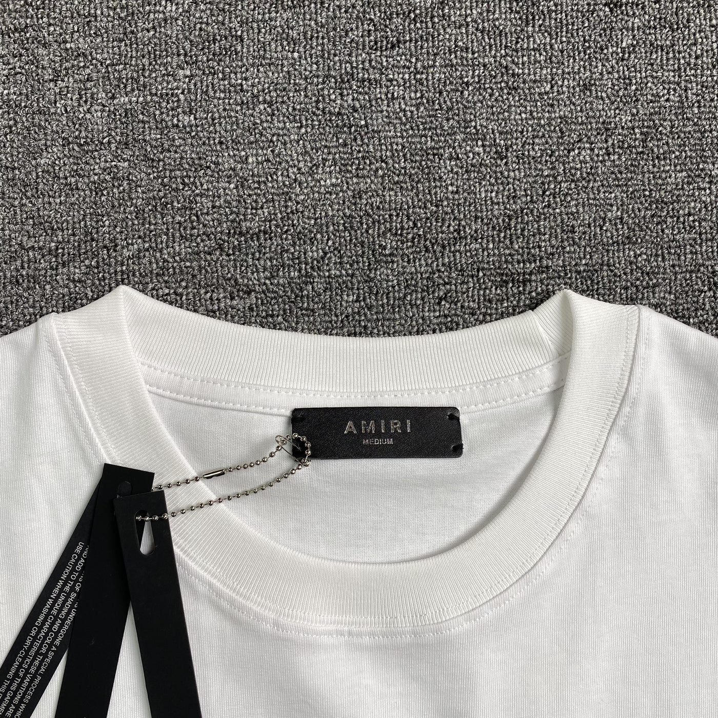 Amiri Tee