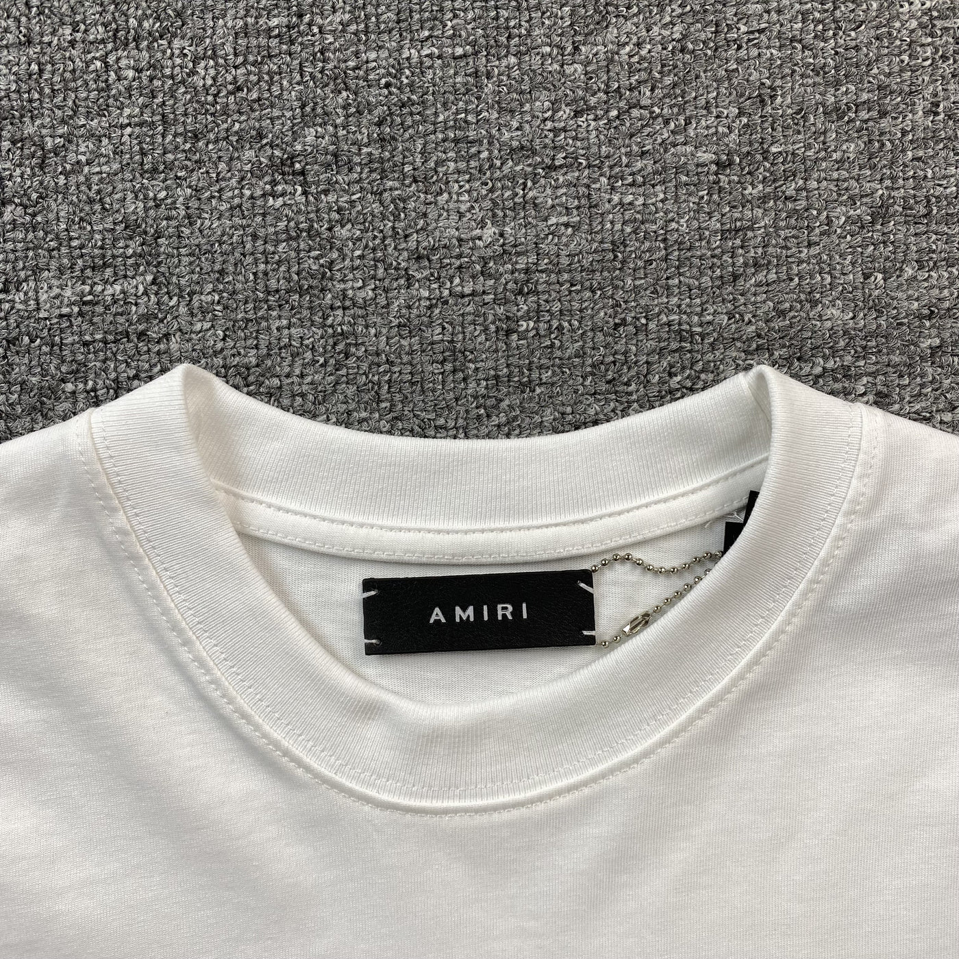 Amiri Tee