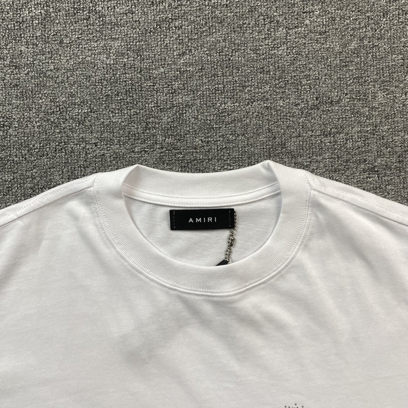 Amiri Tee