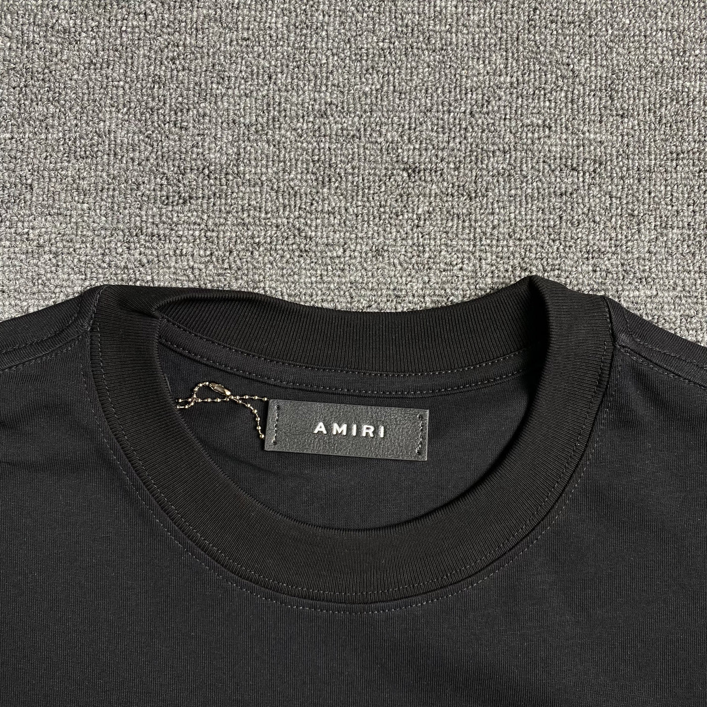 Amiri Tee