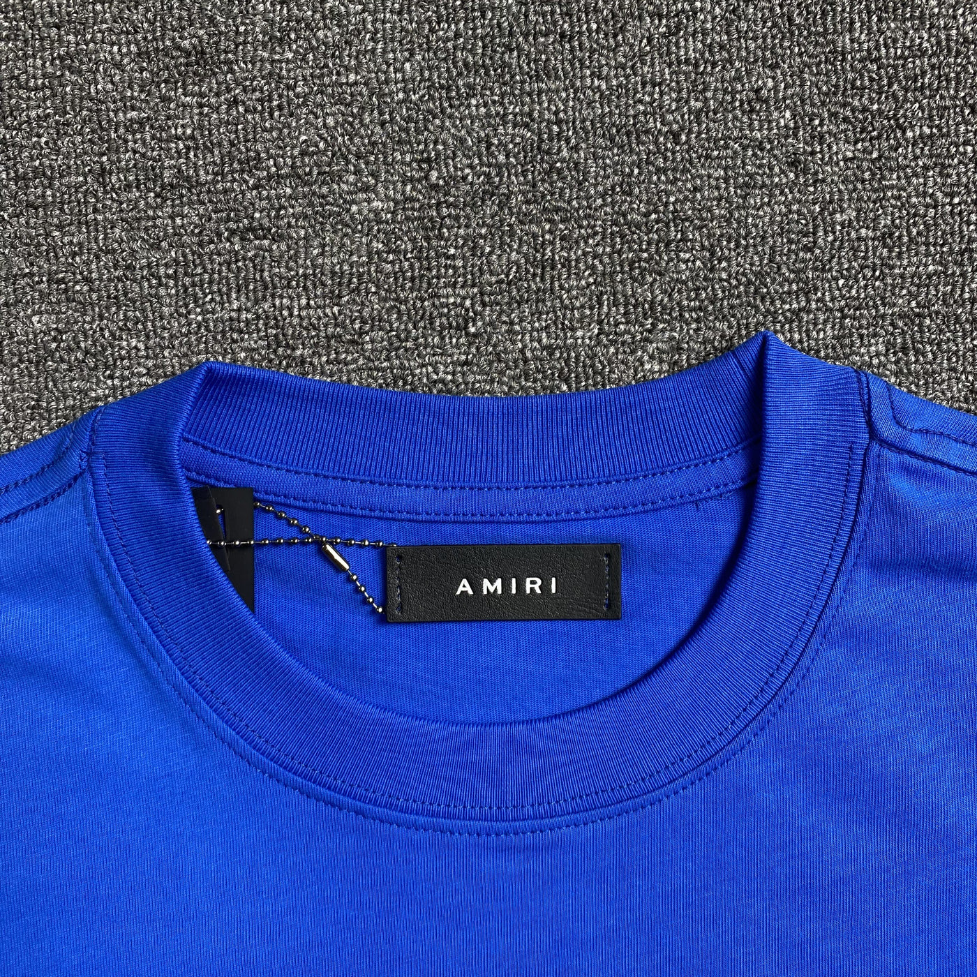 Amiri Tee