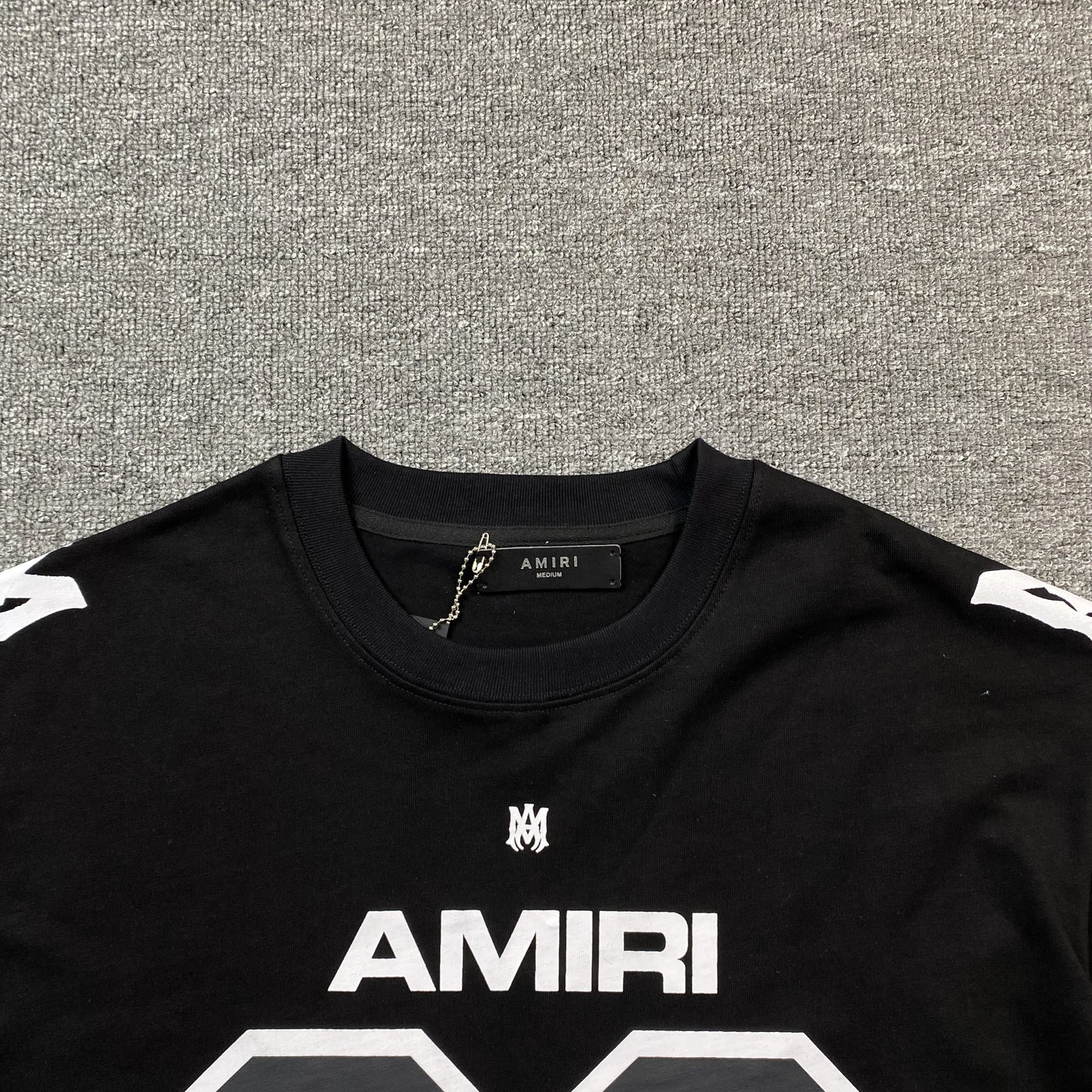 Amiri Tee