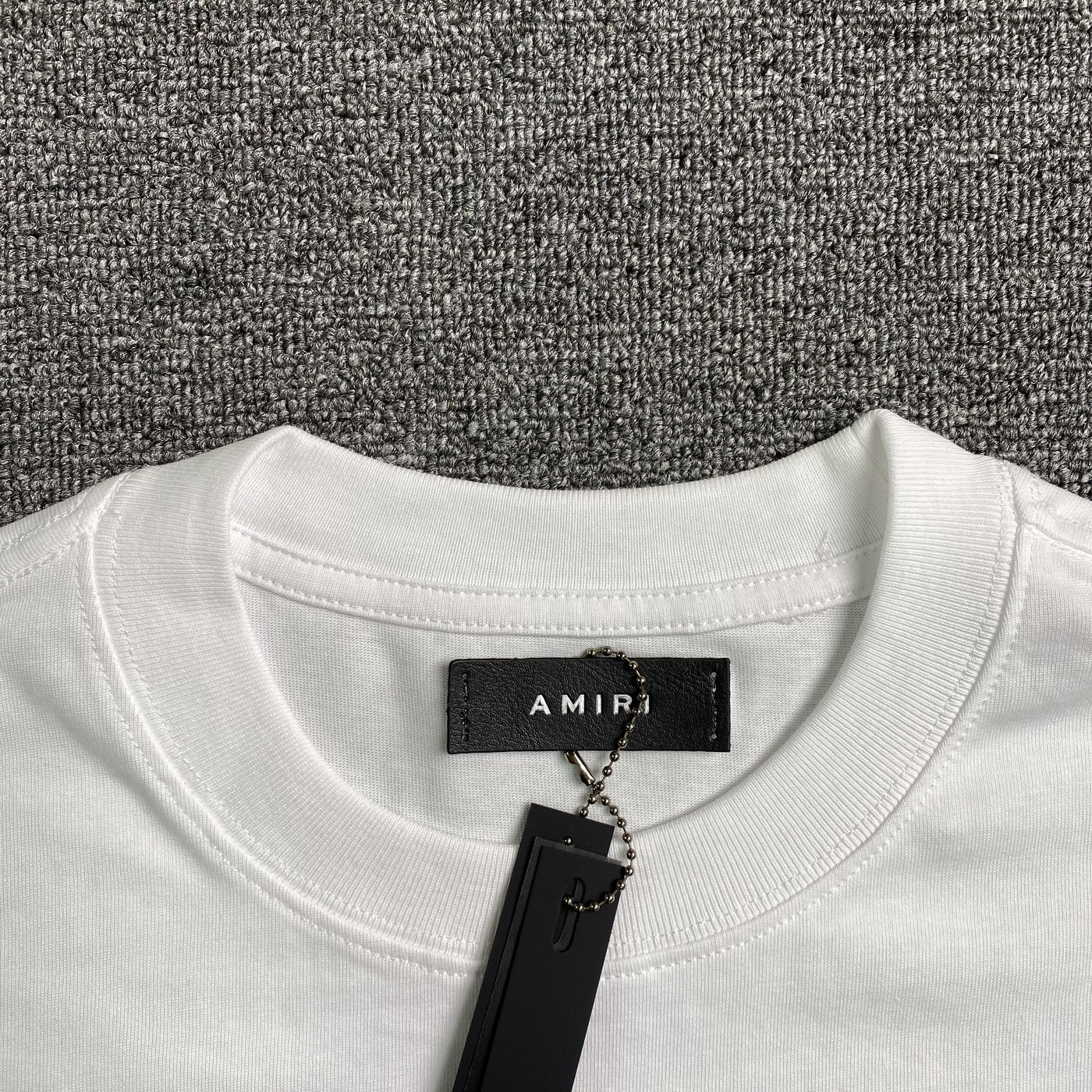 Amiri Tee