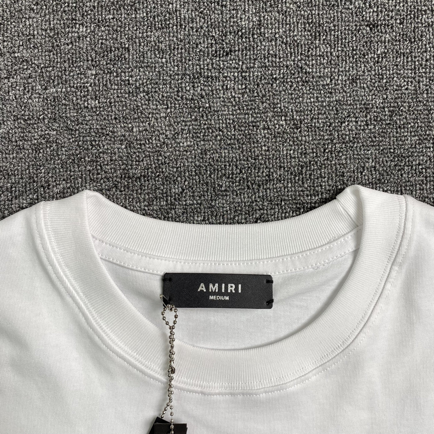 Amiri Tee