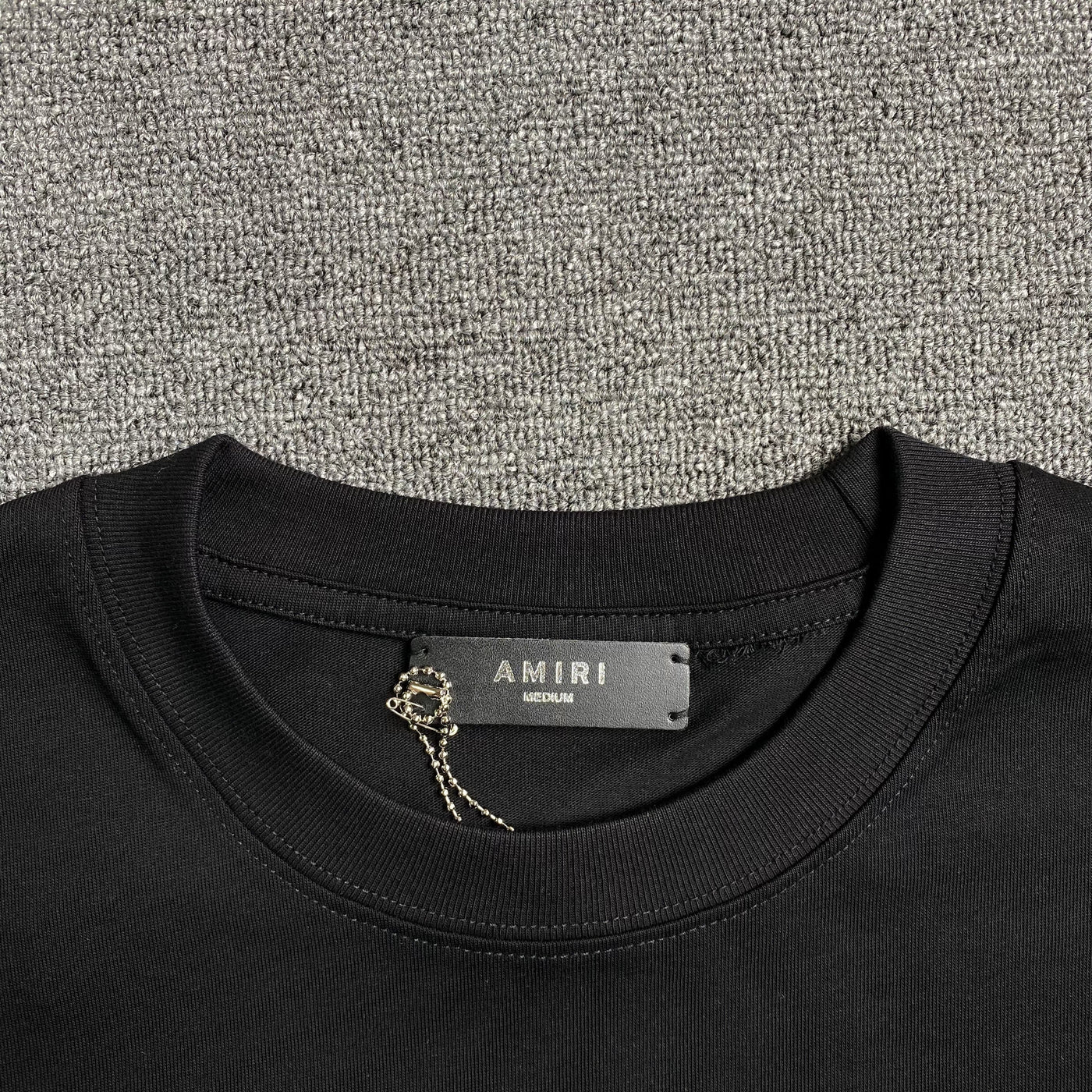 Amiri Tee