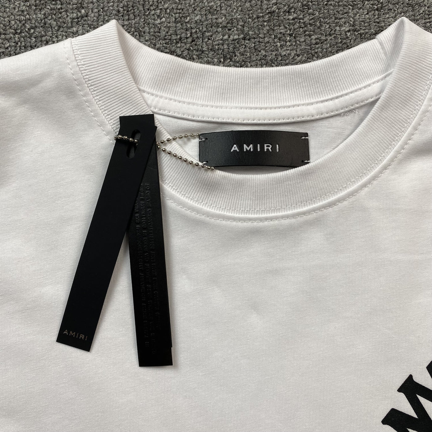 Amiri Tee