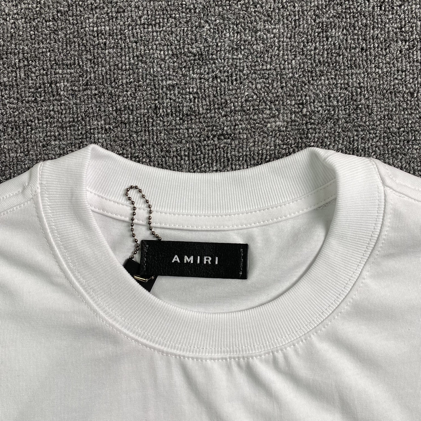 Amiri Tee