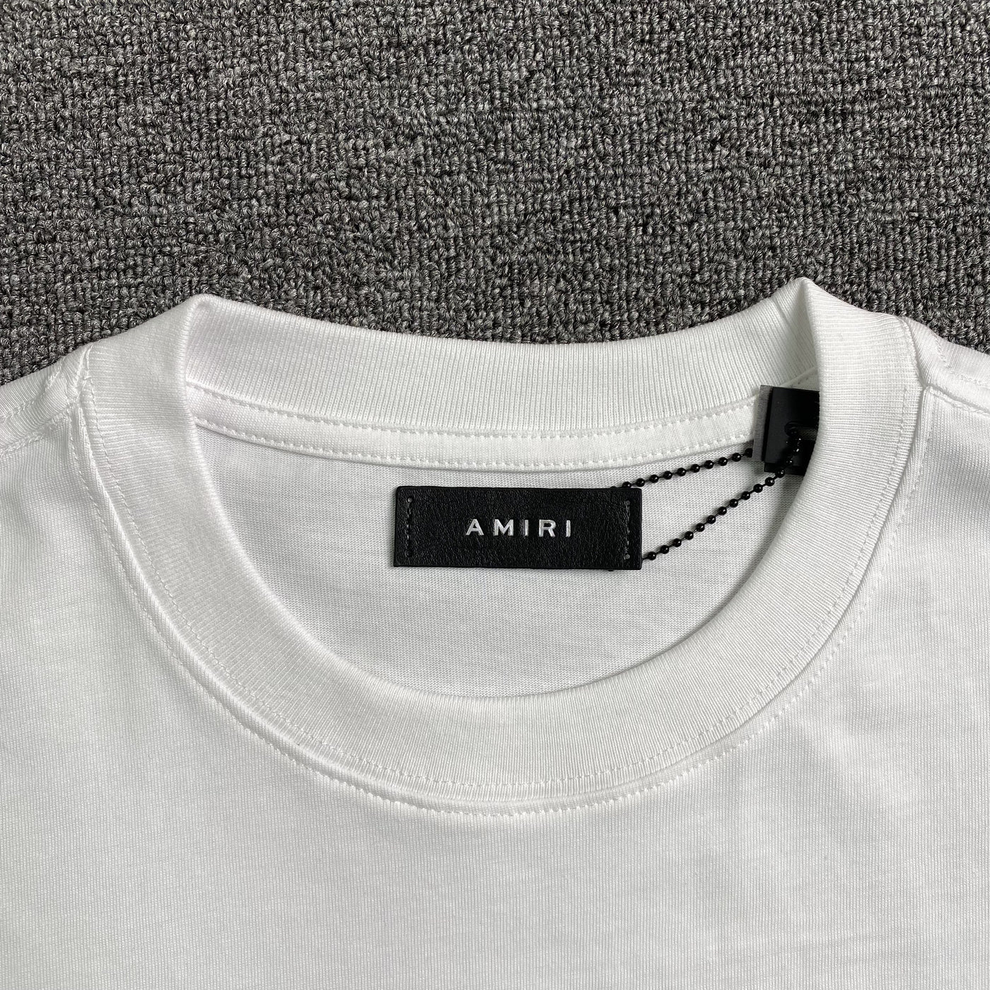 Amiri Tee