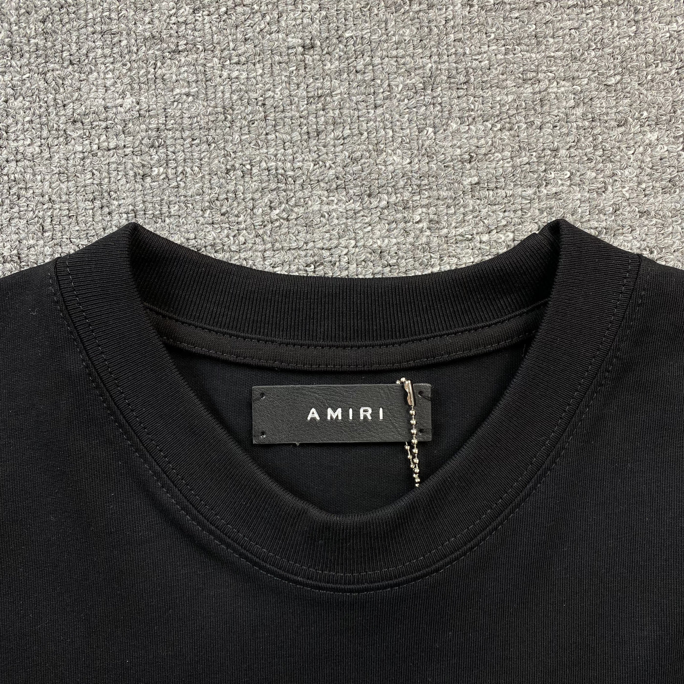 Amiri Tee