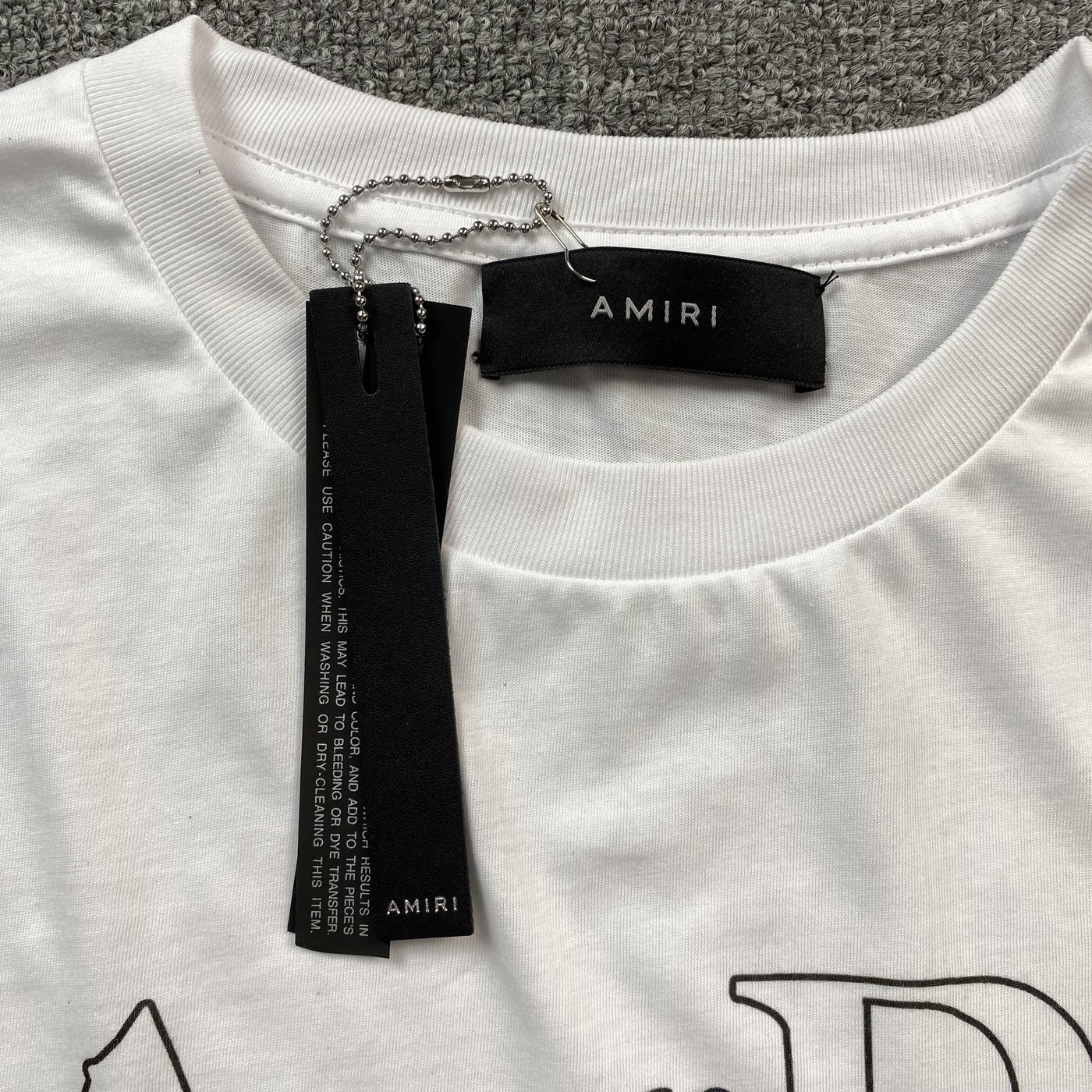 Amiri Tee