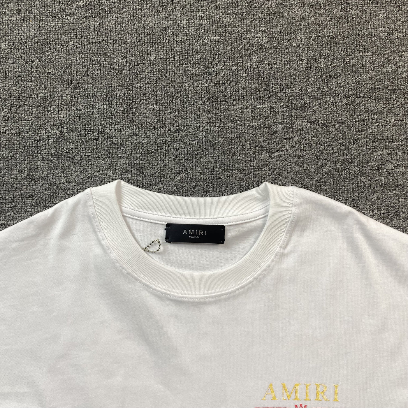 Amiri Tee