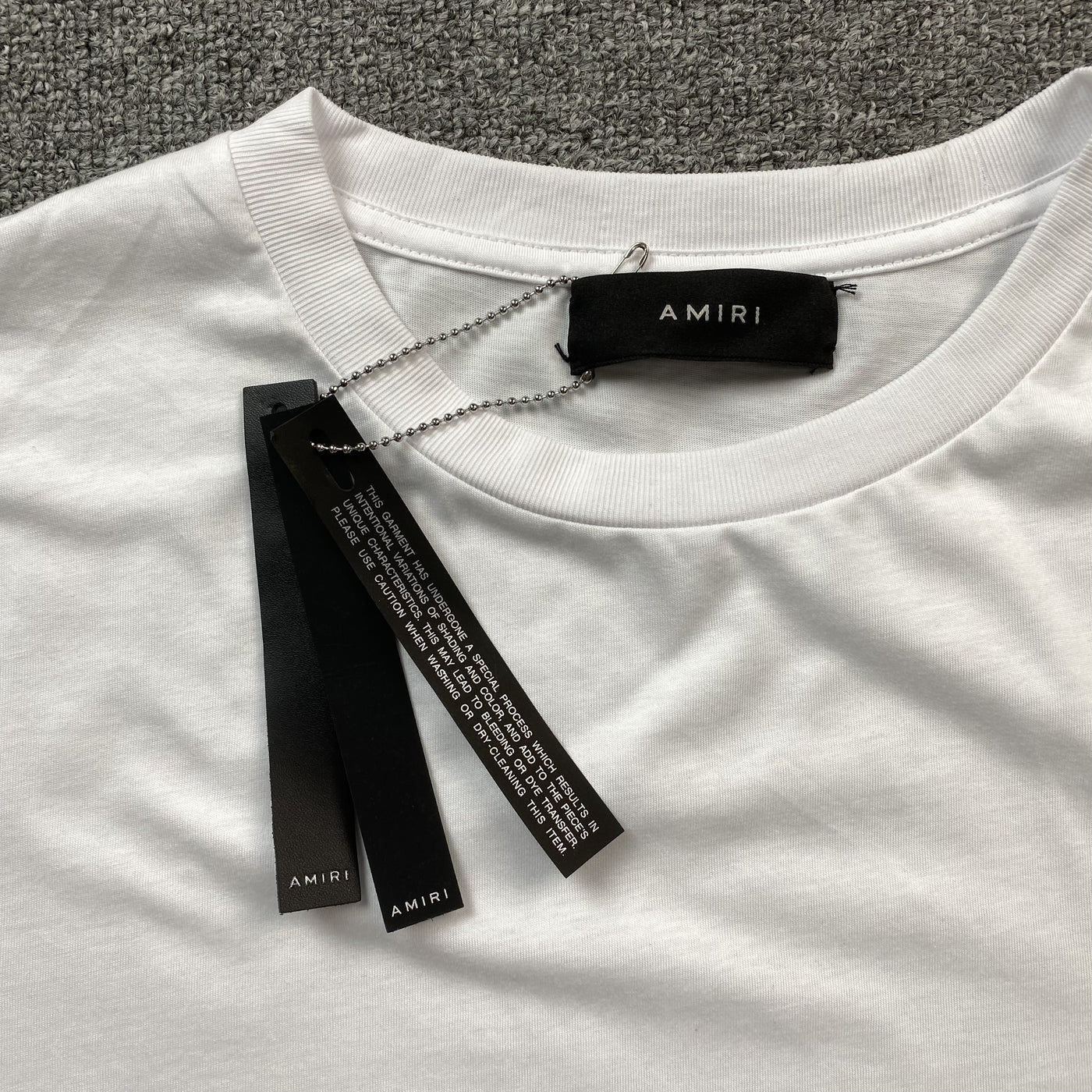 Amiri Tee