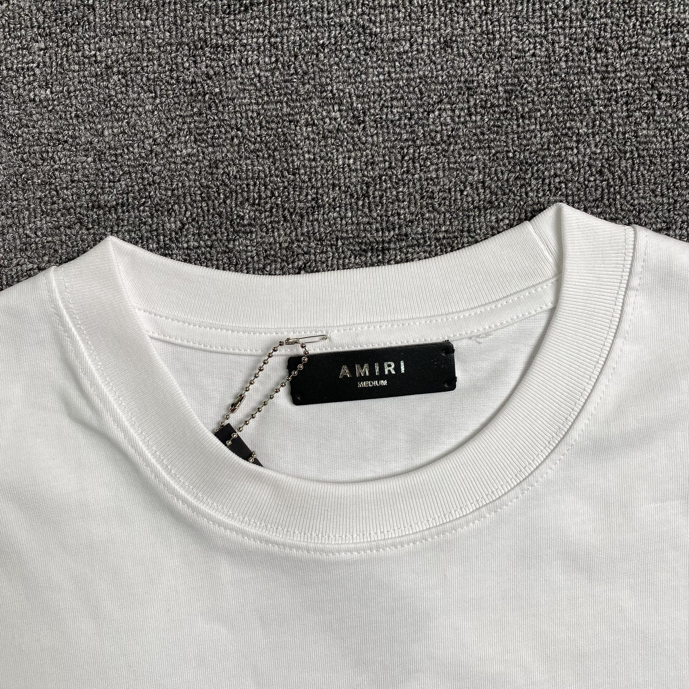 Amiri Tee