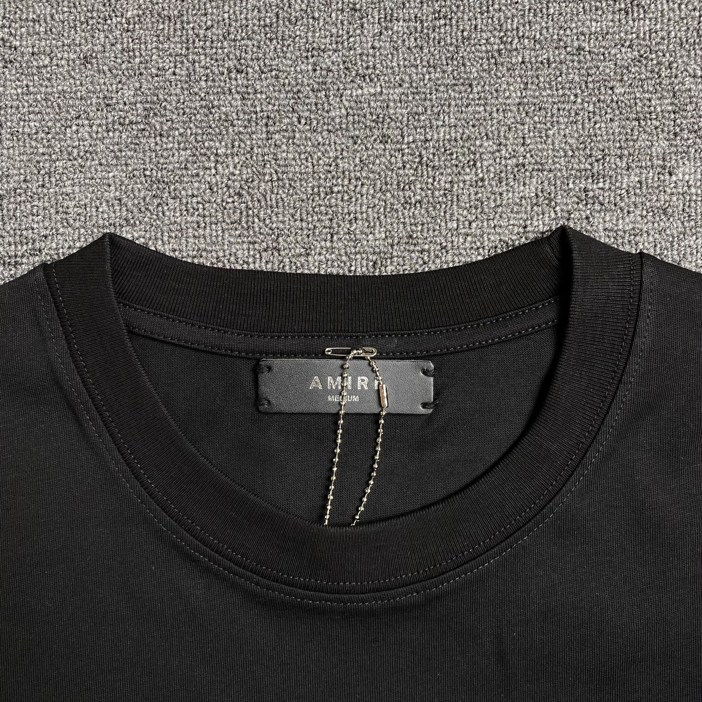 Amiri Tee